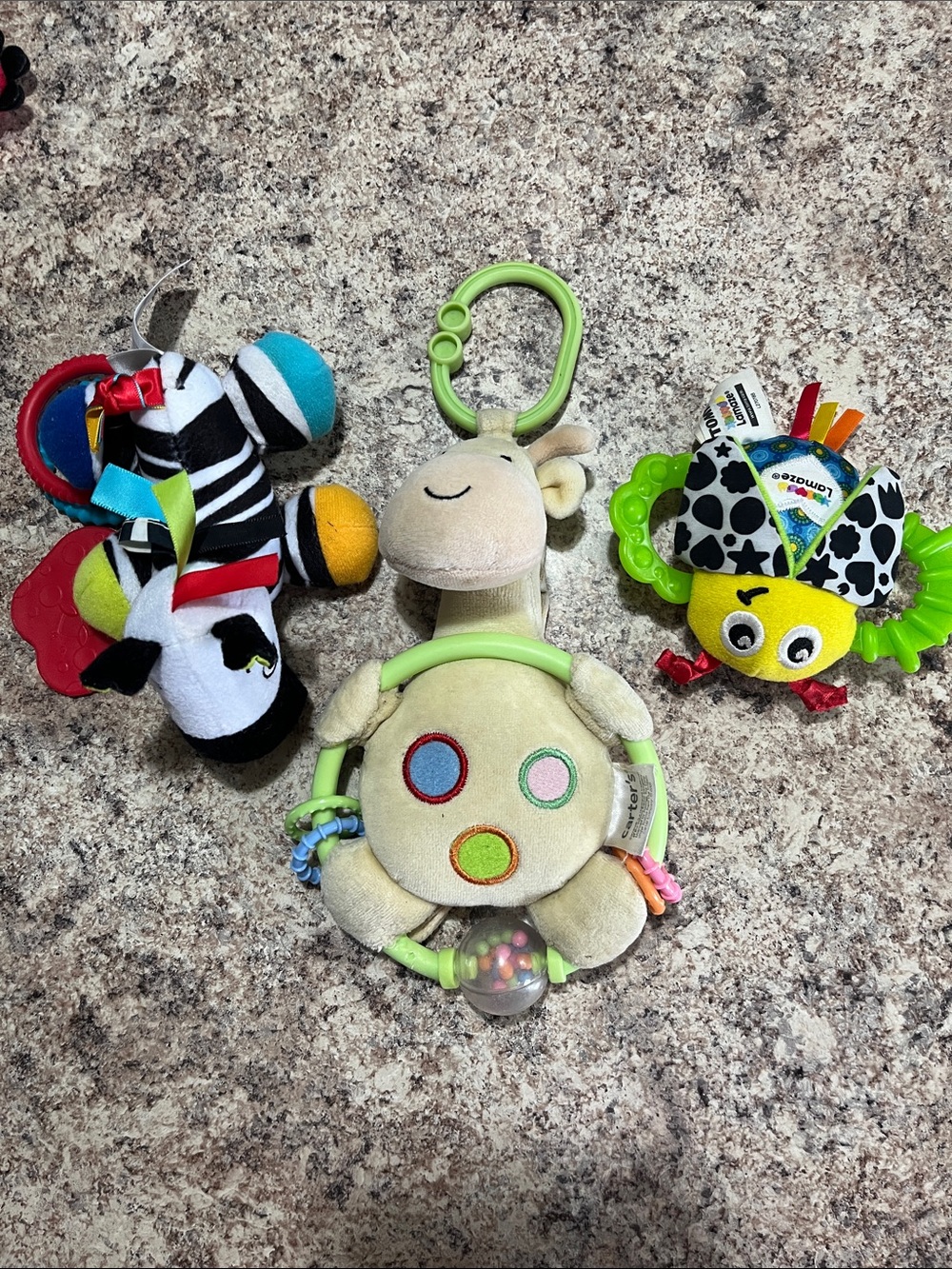 Plush Giraffe Rattle Toy, zebra toy, and Lamaze toy.
